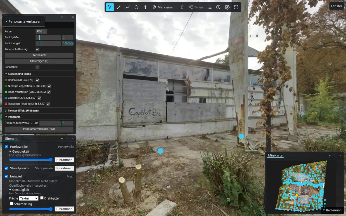 Spherical panorama at a station in the yard: façade with window band and graffiti, toolbars and panels around