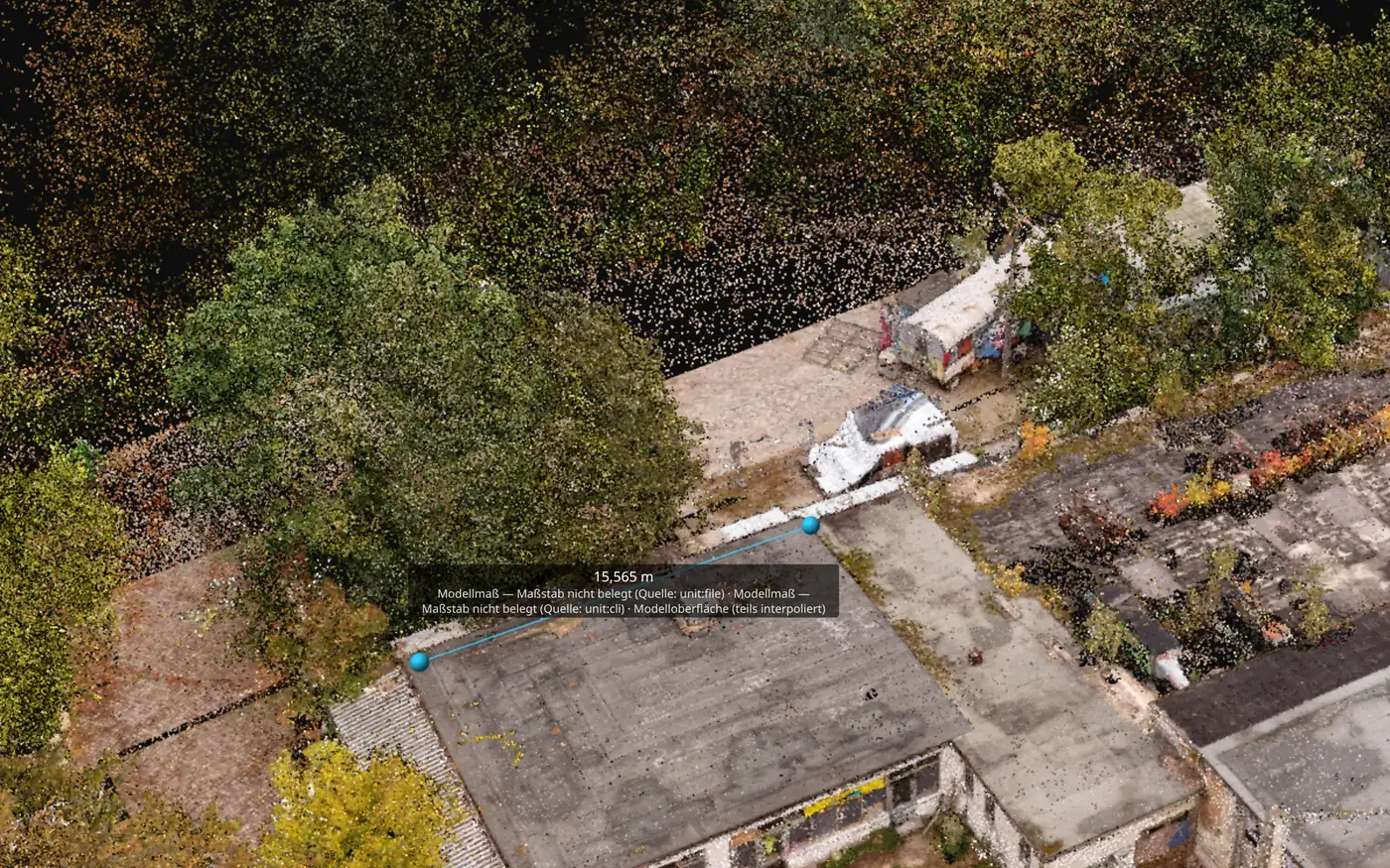 siteBits viewer: dense coloured point cloud of flat roofs among trees, a distance line across a roof edge labelled 15.565 m